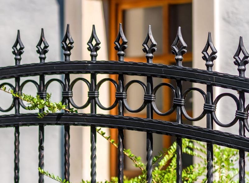Colorful Wrought Iron Fence Artwork
